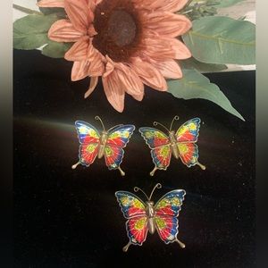 Three vintage butterfly brooches